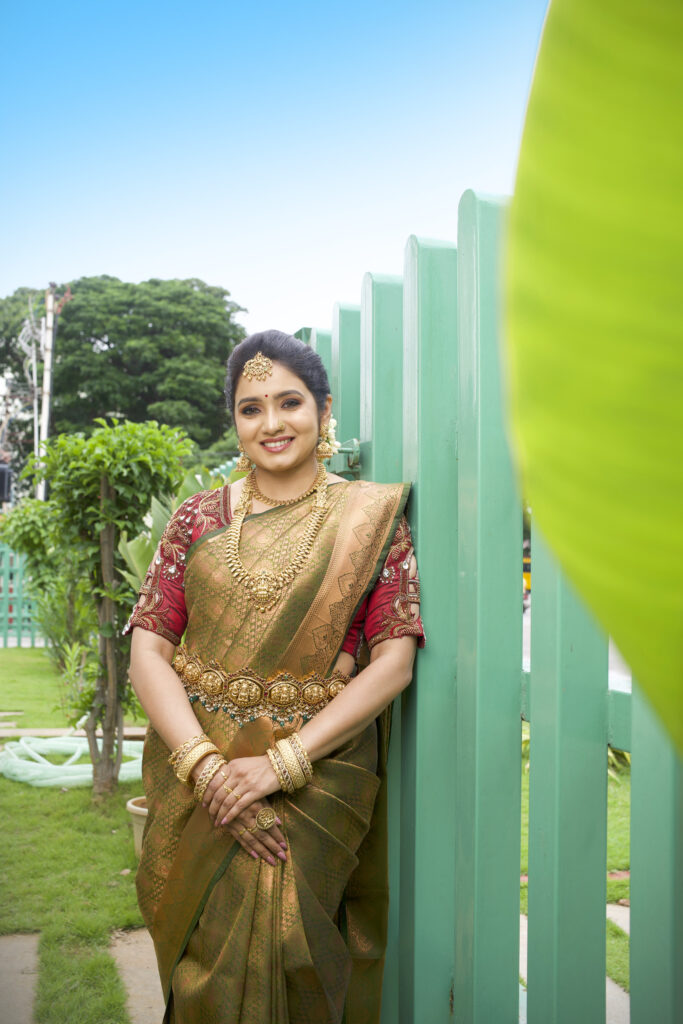 Traditional bridal makeup with floral hair accessories by Lara Styles Unisex Salon Coimbatore